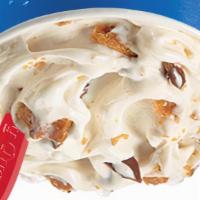 Butterfinger Blizzard · Butterfinger® candy pieces blended with creamy vanilla soft serve.