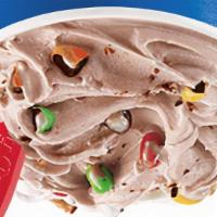 M&M · Vanilla soft serve with m&m candy pieces blended. Does not include chocolate syrup unless re...