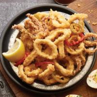 Spiked Calamari · Tossed with cherry peppers and served with a side of spicy marinara.