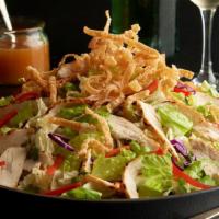 Thai Chicken Salad · Grilled chicken, bell peppers, cilantro, Napa cabbage, wontons, peanut sauce, and honey-lime...