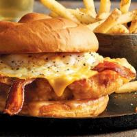 The Dilemma · Hand-breaded chicken breast topped with miso maple butter, white cheddar, an over-medium fri...