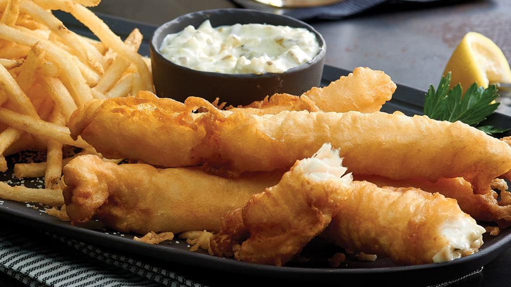 Fish & Chips · Beer-battered white fish, served with creamy coleslaw, fries, malt vinegar, and tartar sauce.