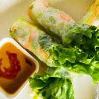 Little V Spring Roll (2Pcs) · Hand-wrapped in rice paper with lettuce rice noodle shrimp and mango carrots herbs roasted p...