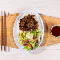 Teriyaki Beef Plate · Grilled sliced beef with housemade teriyaki sauce, your choice of a base and mixed vegetables.
