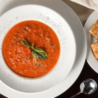 Tomato Basil · Roasted roma tomatoes and fresh basil, simmered in a creamy tomato bisque.