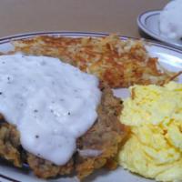 Chicken Fried Steak · Topped with cream gravy served with two eggs any style.
