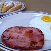 French Toast Combo · 4 Triangles of French Toast served with 2 eggs any style and your choice of bacon, sausage, ...