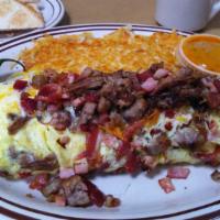 Meat Lover'S Omelette · Shredded beef, bacon, ham, sausage, and cheese. Served with a side of salsa