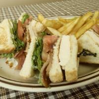 Chicken Club Sandwich · Grilled chicken breast, bacon, sliced tomatoes, lettuce and mayo on your choice of white or ...