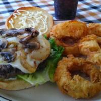 Old-Fashioned Cheeseburger · All beef patty served with grilled mushrooms and onions, lettuce, sliced tomatoes, sliced pi...