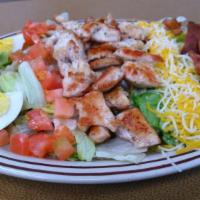 Classic Bj'S Salad · Mixed lettuce, grilled chicken, diced tomatoes, hard boiled egg, diced bacon and cheese.