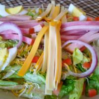 Chef Salad · Mix lettuce, sliced ham, and turkey diced tomatoes, red onions, hard boiled egg and cheese.
