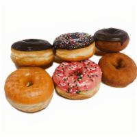 Assorted Mixed Donut Dozen (No Tax) · Mixed Donut Dozen of
-Glazed Donut
-Chocolate Donut
-Fancy Donut
-Cake Donut