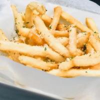 Truffle Parmesan Fries · A generous order of French Fries tossed in Truffle oil and Vegan Parmesan Cheese.