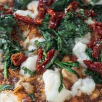 Sicilian Chicken, Spinach,  & Sun-Dried Tomato Pizza. · Hand tossed Sicilian dough, topped with soy protein chicken, Roasted Tomato Sauce, Spinach, ...