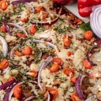 Texas Bar-B-Q Chick-N Pizza. · House Made Chipotle Bar-B-Q Sauce, Nut Free Vegan Mozzarella, Soy Chicken,  & Red Onions. (S...
