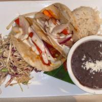 Paneer Tacos · Spicy. Two corn tortilla tacos with paneer cheese, grilled or tempura onions & peppers, topp...