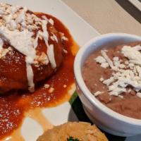Chile Relleno · Roasted poblano pepper filled with your choice of ground beef, shredded chicken or cheese on...
