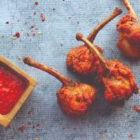 Chicken Lollipops (4 Pc) · Hand pulled chicken wings. Served with Hot Chili sauce.