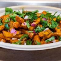 Masala Fries · Loaded fries doused with tikka masala, onions, scallions, cilantro and covered in sweet and ...