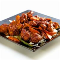 Gobi Manchuria (Vg) · Gobi [cauliflower], bell peppers, onions, & carrots, tossed in zesty soy sauce
