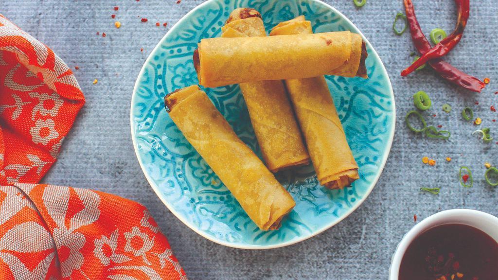 Veg Spring Rolls (4 Pc) (Vg) · Vegetable spring rolls stuffed with shredded carrots, cabbage, bell peppers and onions.