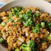 Basil Fried Rice · Basil sauce, Thai peppers, scallions, bell peppers, carrots, cabbage, fish sauce, & fresh ba...