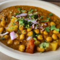 Chole Masala (Gf) (Vg) · Garbanzo beans simmered in our house made tomato & onion sauce and tempered with fresh ginge...
