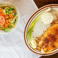 Grilled Blackened Catfish · Served on a bed of Cajun rice, tossed salad, and tarter sauce, you may substitute a vegetabl...