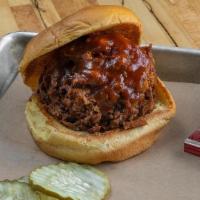 Brisket Sandwich · Chopped or sliced Brisket sandwhich (served with onions, pickles, BBQ sauce on side)