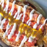 Sonoran Hot Dog · Bacon wrapped hot dog, pinto beans, sauteed onions, diced onions, diced tomatoes, mayo, must...