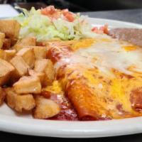 Cheese Enchilada Plate · THREE CHEESE ENCHILADAS TOPPED WITH TEX MEX SAUCE MELTED WITH CHEDDAR CHEESE. SERVED WITH RI...