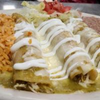Enchiladas Verdes Plate · THREE CHICKEN ENCHILADAS ON CORN TORTILLAS, TOPPED WITH MONTERREY JACK CHEESE MELTED WITH TO...