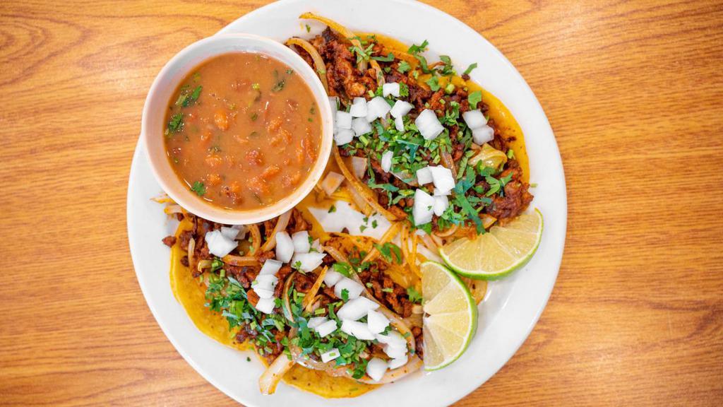 Pastor Taco · SERVED WITH GRILLED ONIONS AND BELL PEPPERS.