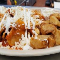 Chilaquiles With Chicken · TORTILLA CHIPS WITH SAUCE OF YOUR CHOICE, QUESO FRESCO, SOUR CREAM AND SHREDDED CHICKEN BREA...