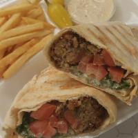 Falafel Rocket Combo · Chickpeas, coriander, dill and spices. Wrapped in pita or tortilla, tomato, eggplant, vegan ...