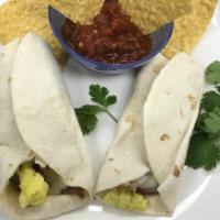 Breakfast Burritos (Each) · Delicious Breakfast Burritos loaded with filling and Oaxaca Cheese.  Choose either Sausage, ...