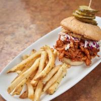 Pulled Chicken · Hand-pulled house-smoked chicken breast, housemade BBQ sauce, cider mustard, coleslaw, spicy...