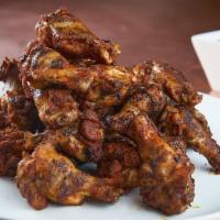 Wings & Fries · Grilled chili-rubbed or fried chili-rubbed smoked wings and drummies. Choice of: BBQ sauce, ...