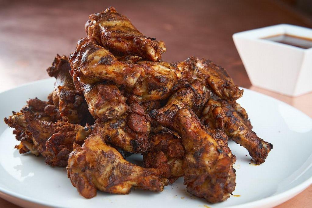 Wings & Fries · Grilled chili-rubbed or fried chili-rubbed smoked wings and drummies. Choice of: BBQ sauce, Carolina mustard BBQ sauce, Nashville hot, buffalo.. Carry out only. Serves 4-6.