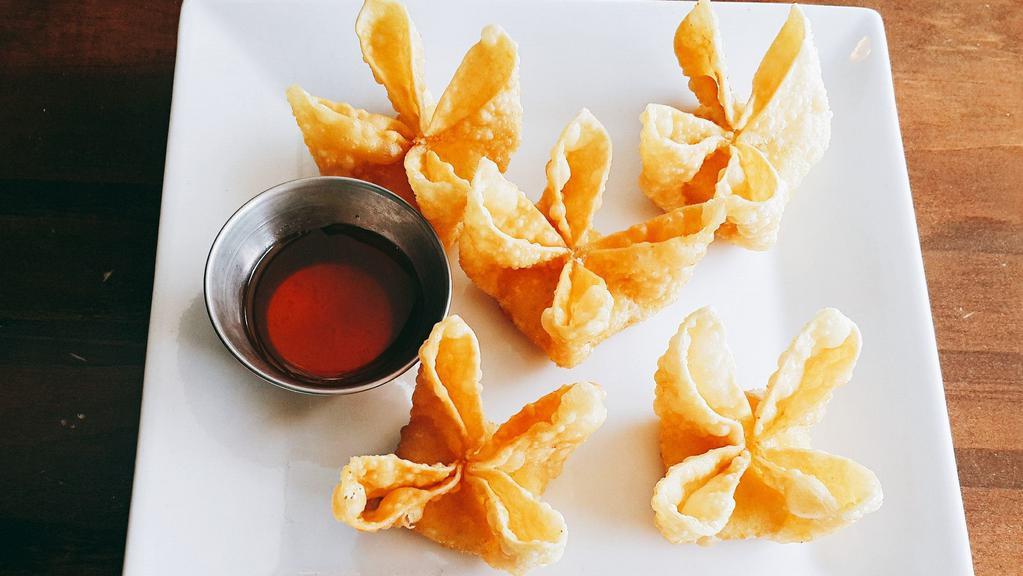 Crab Rangoon · Deep fried wrappers with cream cheese and crab meat, served with side plum sauce.
