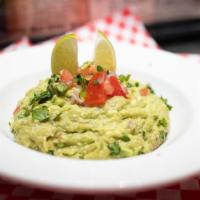Guacamole Dip · Fresh guacamole served with chips n' salsa.