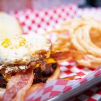 Bacon, Egg & Cheese Burger · Topped with american cheese, hash browns, bacon and egg cooked to order.