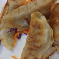 Gyoza · Pan fry pork dumplings.