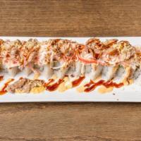 Land & Sea Roll · Shrimp tempura, cream cheese avocado, topped with boiled shrimp, crab salad thin sliced beef...
