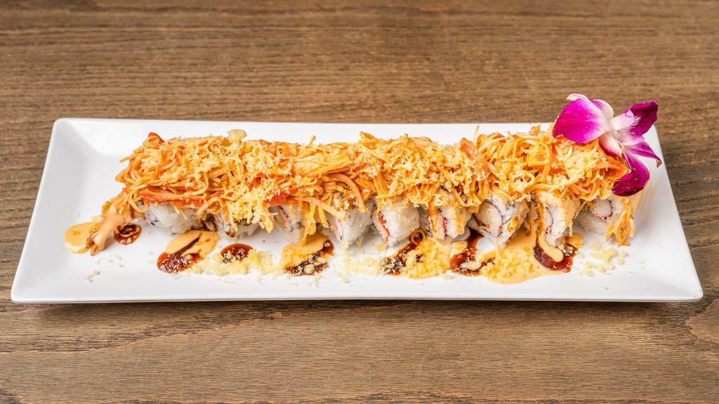 Batman Roll · Shrimp tempura, cream cheese, avocado, topped with boiled shrimp, spicy crab salad, eel sauce, spicy mayo and crunch.