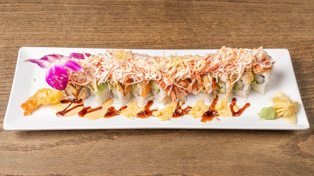 Couture Roll · Shrimp tempura, cream cheese avocado, topped with salmon, crab, shrimp, avocado, eel sauce, spicy mayo, crab salad and crunch.