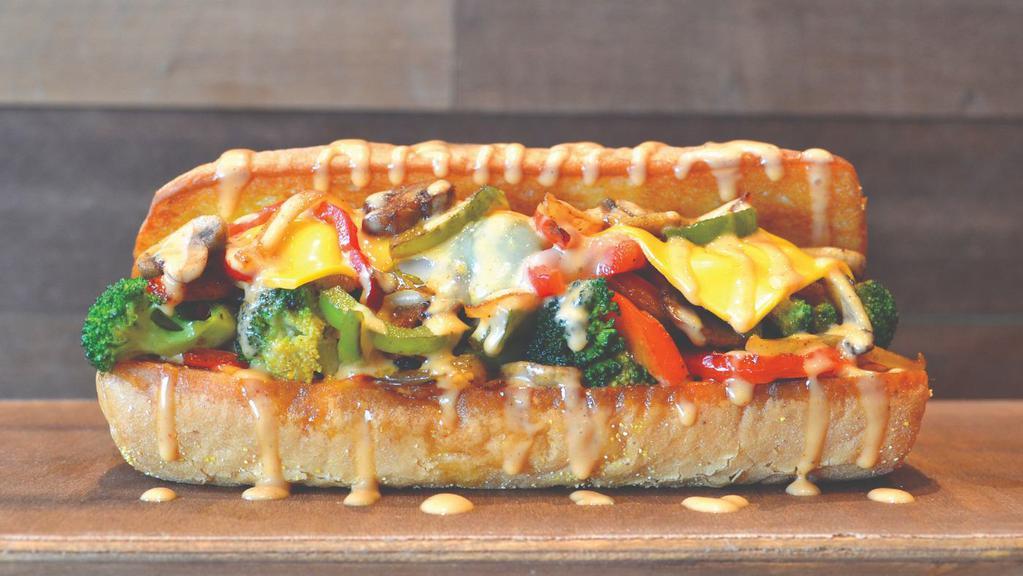Veggie Philly · Sautéed broccoli, onions, red and green peppers, and mushrooms topped with Provolone cheese, American cheese, and lucky aioli sauce. Served on a traditional hoagie roll.