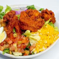 Chicken Strip Salad · Romain hearts and spring mix topped with diced toamtoes, red onion rings, hard boiled egg, c...