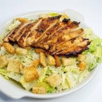Chicken Strip Caesar Salad · Romaine hearts tossed in Caesar dressing with croutons and parmesan cheese. Choice of marina...